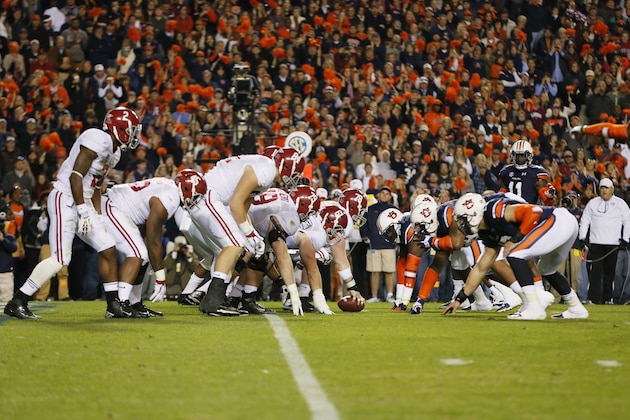 AUBURN, AL - NOVEMBER 30: The line of scrimmage as the Alabama Crimson Tide line up against the Auburn Tigers in the third quarter at Jordan-Hare Stadium on November 30, 2013 in Auburn, Alabama. (Photo by Kevin C. Cox/Getty Images) AUBURN, AL - NOVEMBER 30: The line of scrimmage as the Alabama Crimson Tide line up against the Auburn Tigers in the third quarter at Jordan-Hare Stadium on November 30, 2013 in Auburn, Alabama. (Photo by Kevin C. Cox/Getty Images)
