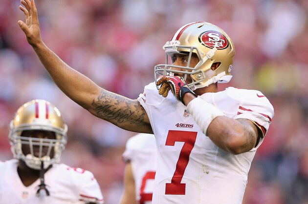 GLENDALE, AZ - DECEMBER 29:  Quarterback Colin Kaepernick #7 of the San Francisco 49ers during the NFL game against the Arizona Cardinals at the University of Phoenix Stadium on December 29, 2013 in Glendale, Arizona.  The 49ers defeated the Cardinals 23-20.  (Photo by Christian Petersen/Getty Images)