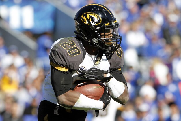 Nov 9, 2013; Lexington, KY, USA; Missouri Tigers running back Henry Josey (20) runs the ball during the game against the Kentucky Wildcats at Commonwealth Stadium. Missouri defeated Kentucky 47-17. Mandatory Credit: Mark Zerof-USA TODAY Sports