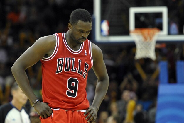 Nov 30, 2013; Cleveland, OH, USA; Chicago Bulls small forward Luol Deng (9) walks to the bench during a timeout in the fourth quarter against the Cleveland Cavaliers at Quicken Loans Arena. Mandatory Credit: David Richard-USA TODAY Sports Nov 30, 2013; Cleveland, OH, USA; Chicago Bulls small forward Luol Deng (9) walks to the bench during a timeout in the fourth quarter against the Cleveland Cavaliers at Quicken Loans Arena. Mandatory Credit: David Richard-USA TODAY Sports