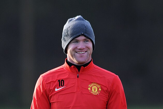 MANCHESTER, ENGLAND - DECEMBER 09: Wayne Rooney of Manchester United looks on during a first team training session, ahead of their UEFA Champions League Group A match against Shakhtar Donetsk, at Aon Training Complex on December 09, 2013 in Manchester, England. (Photo by Chris Brunskill/Getty Images)