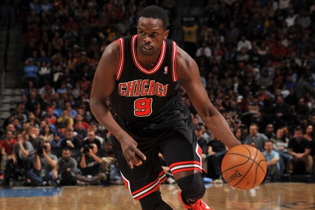 DENVER, CO - NOVEMBER 21: Luol Deng #9 of the Chicago Bulls drives to the basket against the Denver Nuggets on November 21, 2013 at the Pepsi Center in Denver, Colorado. NOTE TO USER: User expressly acknowledges and agrees that, by downloading and/or using this Photograph, user is consenting to the terms and conditions of the Getty Images License Agreement. Mandatory Copyright Notice: Copyright 2013 NBAE (Photo by Bart Young/NBAE via Getty Images)