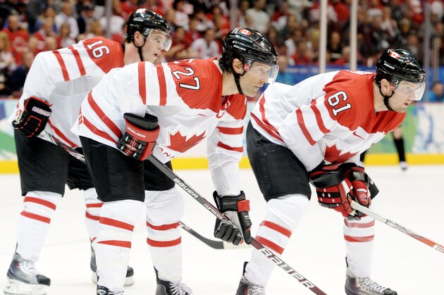 VANCOUVER, BC - FEBRUARY 28:  (L to R) Jonathan Toews #16, Scott Niedermayer #27 and Rick Nash #61 of Canada await a face off during the ice hockey men's gold medal game between USA and Canada on day 17 of the Vancouver 2010 Winter Olympics at Canada Hockey Place on February 28, 2010 in Vancouver, Canada.  (Photo by Harry How/Getty Images)