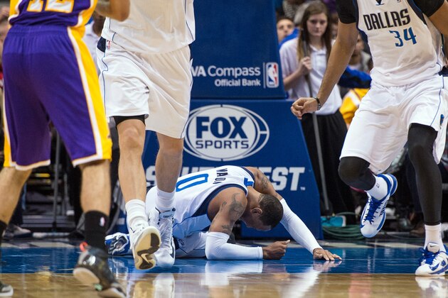 Jan 7, 2014; Dallas, TX, USA; Dallas Mavericks small forward Shawn Marion (0) is injured during the first half against the Los Angeles Lakers at the American Airlines Center. Mandatory Credit: Jerome Miron-USA TODAY Sports