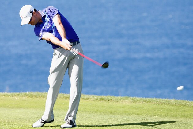 LAHAINA, HI - JANUARY 06:  Zach Johnson plays a shot on the 13th hole during the final round of the Hyundai Tournament of Champions at the Plantation Course at Kapalua Golf Club on January 6, 2014 in Lahaina, Hawaii.  (Photo by Sam Greenwood/Getty Images)