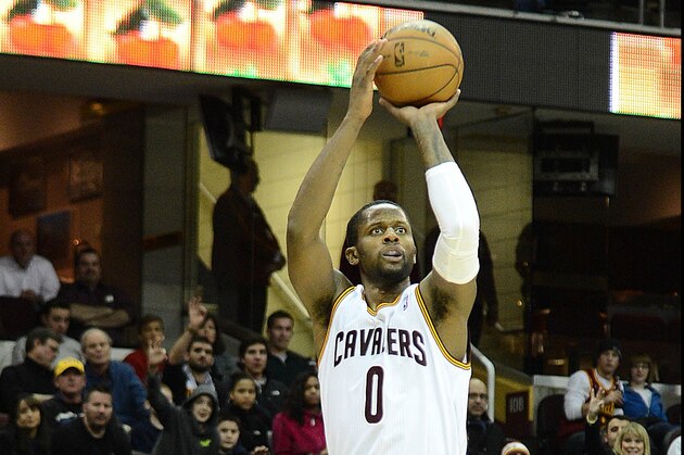 Jan 7, 2014; Cleveland, OH, USA; Cleveland Cavaliers shooting guard C.J. Miles (0) shoots the ball during the game against the Philadelphia 76ers at Quicken Loans Arena. Mandatory Credit: Eric P. Mull-USA TODAY Sports