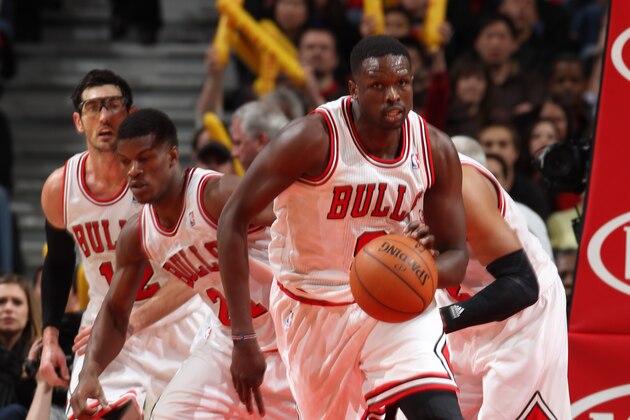 CHICAGO, IL - DECEMBER 31: Luol Deng #9 of the Chicago Bulls brings the ball up court during the game against the Toronto Raptors on December 31, 2013 at the United Center in Chicago, Illinois. NOTE TO USER: User expressly acknowledges and agrees that, by downloading and/or using this photograph, user is consenting to the terms and conditions of the Getty Images License Agreement.  Mandatory Copyright Notice: Copyright 2013 NBAE (Photo by Gary Dineen/NBAE via Getty Images)