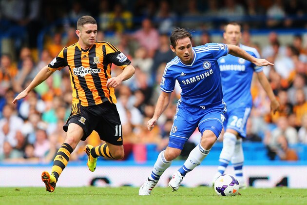 LONDON, ENGLAND - AUGUST 18:  Frank Lampard of Chelsea takes the ball away from Robbie Brady of Hull City during the Barclays Premier League match between Chelsea and Hull City at Stamford Bridge on August 18, 2013 in London, England.  (Photo by Clive Mason/Getty Images)