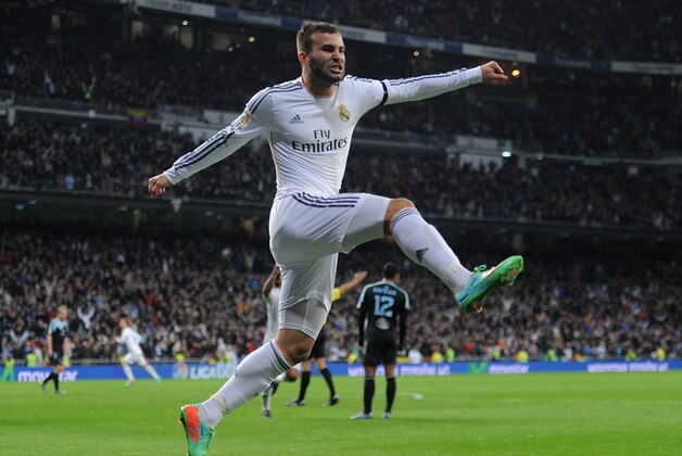 MADRID, SPAIN - JANUARY 06:   Jese Rodriguez of Real Madrid CF celebrates after Karim Benzema scored Real Madrid CF's opening goal during the La Liga match between Real Madrid CF and RC Celta de Vigo at the Santiago Bernabeu stadium on January 6, 2014 in Madrid, Spain.  (Photo by Denis Doyle/Getty Images)