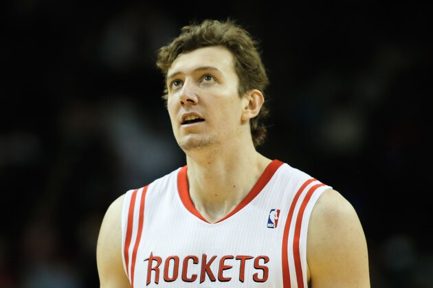 HOUSTON, TX - NOVEMBER 27:   Omer Asik #3 of the Houston Rockets walks up the court during the game against the Atlanta Hawks at Toyota Center on November 27, 2013 in Houston, Texas. NOTE TO USER: User expressly acknowledges and agrees that, by downloading and or using this photograph, User is consenting to the terms and conditions of the Getty Images License Agreement. (Photo by Scott Halleran/Getty Images)