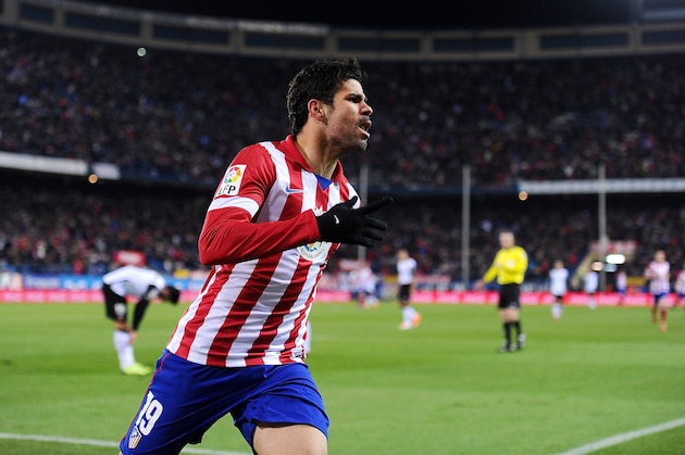 MADRID, SPAIN - DECEMBER 15:  Diego Costa of Club Atletico de Madrid celebrates after scoring Atletico's opening goal during the La Liga match between Club Atletico de Madrid and Valencia CF at Vicente Calderon Stadium on December 15, 2013 in Madrid, Spain.  (Photo by Denis Doyle/Getty Images)