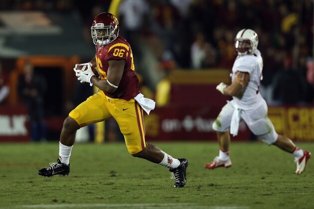 LOS ANGELES, CA - NOVEMBER 16:  Tight end Xavier Grimble #86 of the USC Trojans carries the ball against the Stanford Cardinal at Los Angeles Coliseum on November 16, 2013 in Los Angeles, California.  (Photo by Jeff Gross/Getty Images)