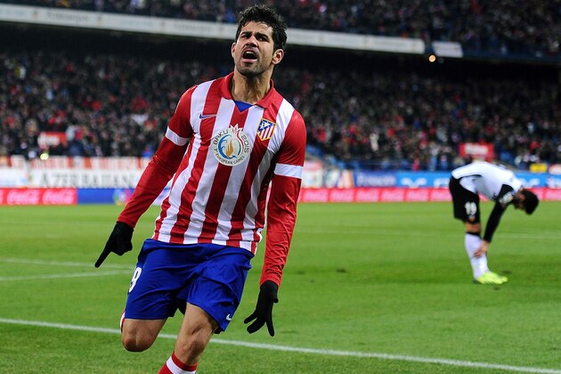 MADRID, SPAIN - DECEMBER 15:  Diego Costa of Club Atletico de Madrid celebrates after scoring Atletico's opening goal during the La Liga match between Club Atletico de Madrid and Valencia CF at Vicente Calderon Stadium on December 15, 2013 in Madrid, Spain.  (Photo by Denis Doyle/Getty Images)
