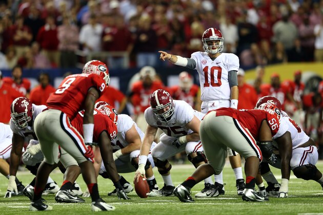 ATLANTA, GA - DECEMBER 01: Quarterback AJ McCarron #10 of the Alabama Crimson Tide motions from the line of scrimmage against the Georgia Bulldogs during the third quarter of the SEC Championship Game at the Georgia Dome on December 1, 2012 in Atlanta, Georgia.  (Photo by Mike Ehrmann/Getty Images)