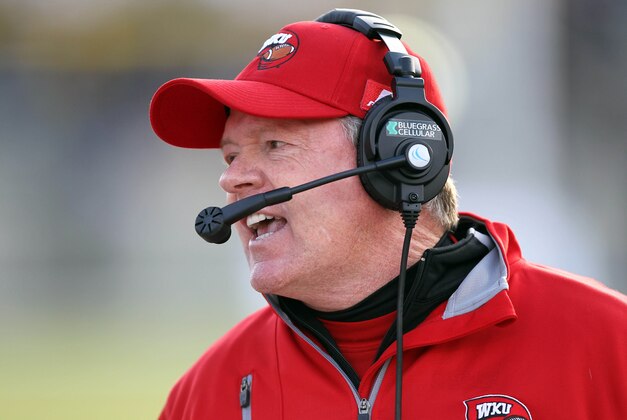 Nov 9, 2013; West Point, NY, USA; Western Kentucky Hilltoppers head coach Bobby Petrino talks with his team during the second half against the Army Black Knights at Michie Stadium. Mandatory Credit: Danny Wild-USA TODAY Sports Nov 9, 2013; West Point, NY, USA; Western Kentucky Hilltoppers head coach Bobby Petrino talks with his team during the second half against the Army Black Knights at Michie Stadium. Mandatory Credit: Danny Wild-USA TODAY Sports