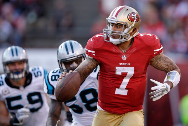 SAN FRANCISCO, CA - NOVEMBER 10:  Colin Kaepernick #7 of the San Francisco 49ers is pressured by Thomas Davis #58 and Luke Kuechly #59 of the Carolina Panthers at Candlestick Park on November 10, 2013 in San Francisco, California.  (Photo by Ezra Shaw/Getty Images)