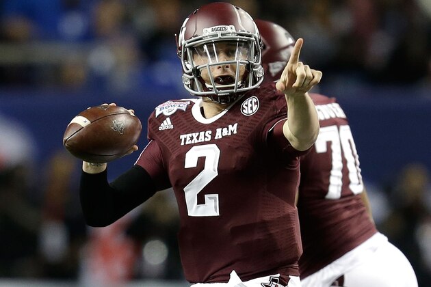 ATLANTA, GA - DECEMBER 31:  Quarterback Johnny Manziel #2 of the Texas A&M Aggies points and looks downfield to pass during the the Chick-fil-A Bowl game against the Duke Blue Devils at the Georgia Dome on December 31, 2013 in Atlanta, Georgia.  (Photo by Mike Zarrilli/Getty Images)