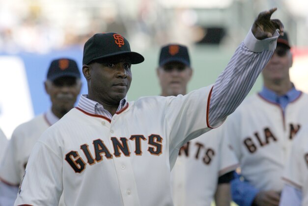 SAN FRANCISCO - AUGUST 9: Barry Bonds throws out a ceremonial first pitch during a San Francisco Giants 50th Anniversary celebration before the game between the Los Angeles Dodgers and San Francisco Giants at AT&T Park on August 9, 2008 in San Francisco, California. (Photo by Max Morse/Getty Images)
