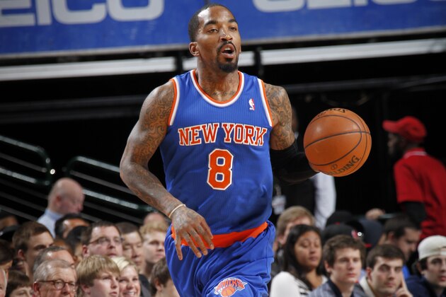 DALLAS, TX - JANUARY 5:  J.R. Smith #8 of the New York Knicks dribbles the ball against the Dallas Mavericks on January 5, 2014 at the American Airlines Center in Dallas, Texas. NOTE TO USER: User expressly acknowledges and agrees that, by downloading and or using this photograph, User is consenting to the terms and conditions of the Getty Images License Agreement. Mandatory Copyright Notice: Copyright 2014 NBAE (Photo by Glenn James/NBAE via Getty Images)