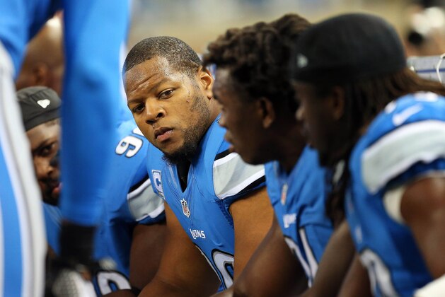 Oct 27, 2013; Detroit, MI, USA; Detroit Lions defensive tackle Ndamukong Suh (90) sits on the bench during 1st half of a game at Ford Field. Mandatory Credit: Mike Carter-USA TODAY Sports