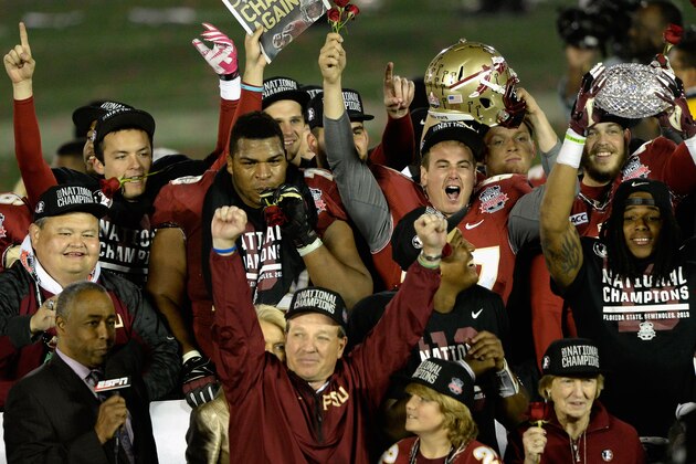 PASADENA, CA - JANUARY 06:  Florida State Seminoles head coach Jimbo Fisher holds the Coaches' Trophy after defeating the Auburn Tigers 34-31 in the 2014 Vizio BCS National Championship Game at the Rose Bowl on January 6, 2014 in Pasadena, California.  (Photo by Kevork Djansezian/Getty Images)