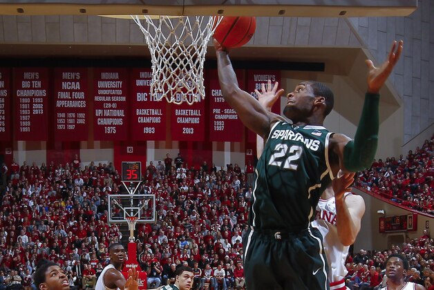 BLOOMINGTON, IN - JANUARY 04: Branden Dawson #22 of the Michigan State Spartans grabs a rebound against the Indiana Hoosiers at Assembly Hall on January 4, 2014 in Bloomington, Indiana. Michigan State defeated Indiana 73-56. (Photo by Michael Hickey/Getty Images)