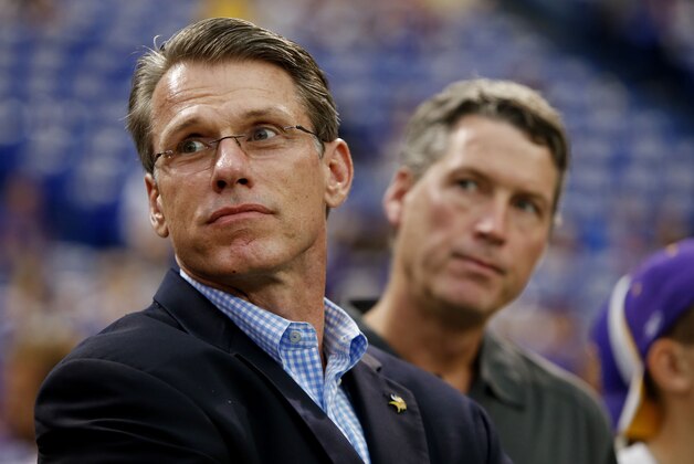 Aug 29, 2013; Minneapolis, MN, USA; Minnesota Vikings General Manager Rick Spielman and Minnesota Wild General Manager Chuck Fletcher watch warm ups before the game with the Tennessee Titans at Mall of America Field at H.H.H. Metrodome. Vikings win 24-23. Mandatory Credit: Bruce Kluckhohn-USA TODAY Sports