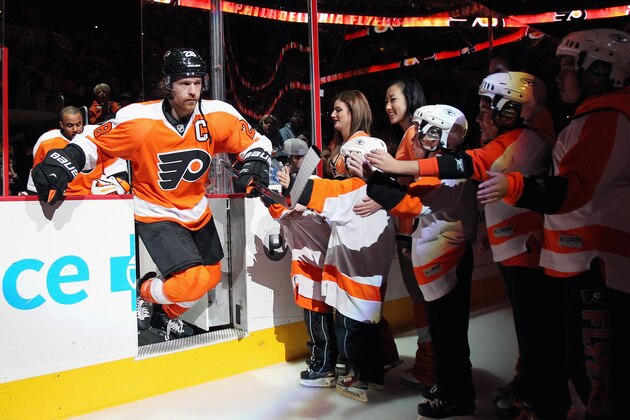 PHILADELPHIA, PA - JANUARY 08: Claude Giroux #28 of the Philadelphia Flyers enters the ice prior to his game against the Montreal Canadiens on January 8, 2014 at the Wells Fargo Center in Philadelphia, Pennsylvania.  (Photo by Len Redkoles/NHLI via Getty Images)