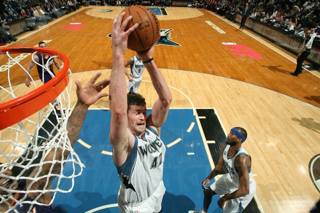 MINNEAPOLIS, MN - JANUARY 8: Kevin Love #42 of the Minnesota Timberwolves rebounds against the Phoenix Suns on January 8, 2014 at Target Center in Minneapolis, Minnesota. NOTE TO USER: User expressly acknowledges and agrees that, by downloading and or using this Photograph, user is consenting to the terms and conditions of the Getty Images License Agreement. Mandatory Copyright Notice: Copyright 2014 NBAE (Photo by David Sherman/NBAE via Getty Images)