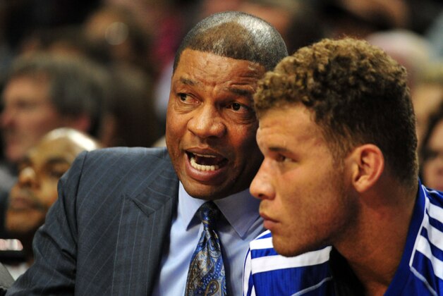 Oct 7, 2013; Portland, OR, USA; Los Angeles Clippers head coach Doc Rivers speaks with power forward Blake Griffin (32) on the bench during the second quarter of the game against the Portland Trail Blazers at Moda Center. Mandatory Credit: Steve Dykes-USA TODAY Sports Oct 7, 2013; Portland, OR, USA; Los Angeles Clippers head coach Doc Rivers speaks with power forward Blake Griffin (32) on the bench during the second quarter of the game against the Portland Trail Blazers at Moda Center. Mandatory Credit: Steve Dykes-USA TODAY Sports