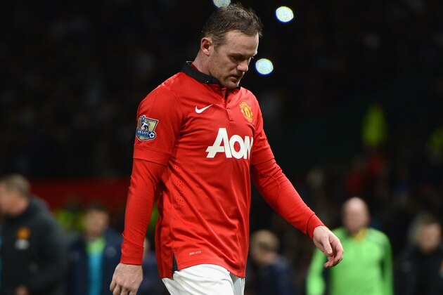 MANCHESTER, ENGLAND - JANUARY 01: Wayne Rooney of Manchester United walks off at the end of the Barclays Premier League match between Manchester United and Tottenham Hotspur at Old Trafford on January 1, 2014 in Manchester, England. (Photo by Michael Regan/Getty Images) MANCHESTER, ENGLAND - JANUARY 01: Wayne Rooney of Manchester United walks off at the end of the Barclays Premier League match between Manchester United and Tottenham Hotspur at Old Trafford on January 1, 2014 in Manchester, England. (Photo by Michael Regan/Getty Images)