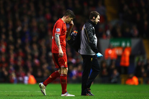 LIVERPOOL, ENGLAND - JANUARY 05: Daniel Agger of Liverpool goes off to receive treatment during the Budweiser FA Cup third round match between Liverpool and Oldham Athletic at Anfield on January 5, 2014 in Liverpool, England.  (Photo by Clive Mason/Getty Images)