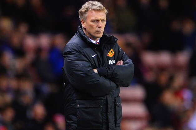 SUNDERLAND, ENGLAND - JANUARY 07:  David Moyes manager of Manchester United looks on during the Capital One Cup Semi-Final, first leg match between Sunderland and Manchester United at Stadium of Light on January 7, 2014 in Sunderland, England.  (Photo by Michael Regan/Getty Images)