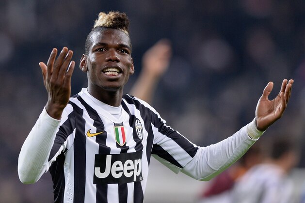 TURIN, ITALY - JANUARY 05:  Paul Pogba of Juventus FC celebrates victory at the end of the Serie A match between Juventus and AS Roma at Juventus Arena on January 5, 2014 in Turin, Italy.  (Photo by Claudio Villa/Getty Images)