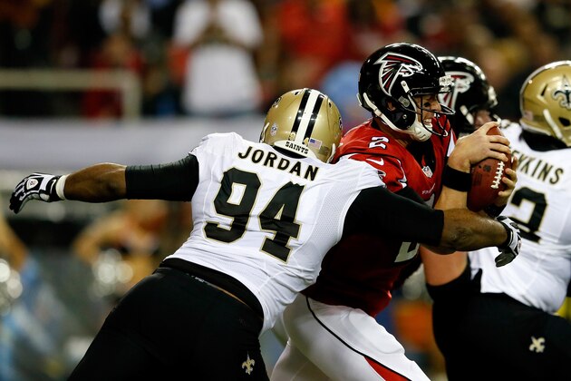 ATLANTA, GA - NOVEMBER 21: Defensive end Cameron Jordan #94 of the New Orleans Saints sacks quarterback Matt Ryan #2 of the Atlanta Falcons during a game at the Georgia Dome on November 21, 2013 in Atlanta, Georgia.  (Photo by Kevin C. Cox/Getty Images)