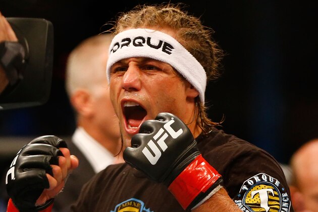 BOSTON, MA - AUGUST 17: Urijah Faber celebrates following his win against Iuri Alcantara in their bantamweight bout at TD Garden on August 17, 2013 in Boston, Massachusetts. (Photo by Jared Wickerham/Getty Images)