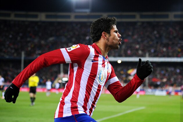 MADRID, SPAIN - DECEMBER 15:  Diego Costa of Club Atletico de Madrid celebrates after scoring Atletico's opening goal during the La Liga match between Club Atletico de Madrid and Valencia CF at Vicente Calderon Stadium on December 15, 2013 in Madrid, Spain.  (Photo by Denis Doyle/Getty Images)