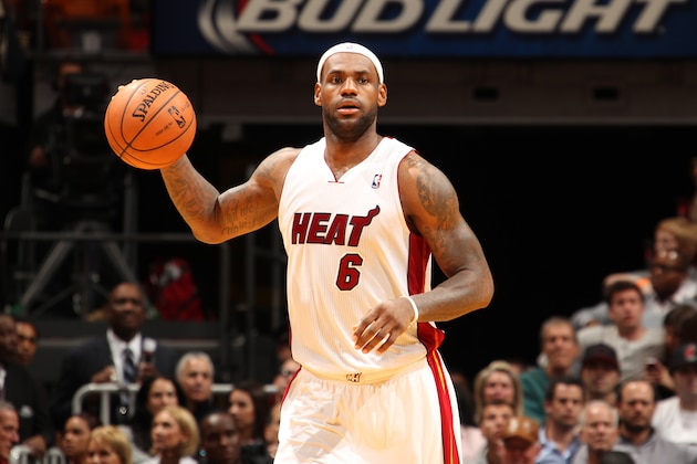 MIAMI, FL - JANUARY 7: LeBron James #6 of the Miami Heat dribbles the ball up the court against the New Orleans Pelicans at the American Airlines Arena in Miami, Florida on Jan. 7, 2014. NOTE TO USER: User expressly acknowledges and agrees that, by downloading and/or using this photograph, user is consenting to the terms and conditions of the Getty Images License Agreement. Mandatory copyright notice: Copyright NBAE 2014 (Photo by Issac Baldizon/NBAE via Getty Images)