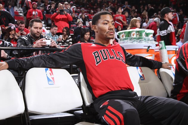 PORTLAND, OR - NOVEMBER 22:  Derrick Rose #1 of the Chicago Bulls sits on the bench before the game against the Portland Trail Blazers on November 22, 2013 at the Moda Center Arena in Portland, Oregon. NOTE TO USER: User expressly acknowledges and agrees that, by downloading and or using this photograph, user is consenting to the terms and conditions of the Getty Images License Agreement. Mandatory Copyright Notice: Copyright 2013 NBAE (Photo by Sam Forencich/NBAE via Getty Images)