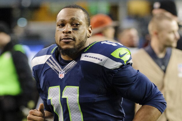 Nov 17, 2013; Seattle, WA, USA; Seattle Seahawks wide receiver Percy Harvin (11) jogs off the field after the game between the Seattle Seahawks and the Minnesota Vikings at CenturyLink Field. Seattle defeated Minnesota 41-20. Mandatory Credit: Steven Bisig-USA TODAY Sports