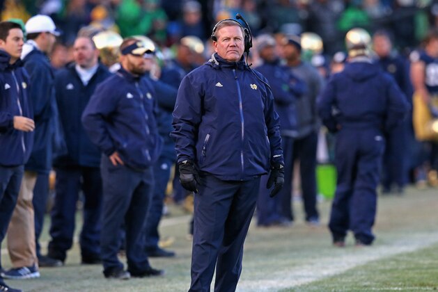 SOUTH BEND, IN - NOVEMBER 02:  Head coach Brian Kelly of the Notre Dame Fighting Irish walks the sidelines during a game against the Navy Midshipmen at Notre Dame Stadium on November 2, 2013 in South Bend, Indiana. Notre Dame defeated Navy 38-34.  (Photo by Jonathan Daniel/Getty Images)