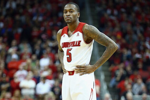LOUISVILLE, KY - NOVEMBER 29: Kevin Ware #5 of the Louisville Cardinals watches the action during the game against the Southern Mississippi Golden Eagles at KFC YUM! Center on November 29, 2013 in Louisville, Kentucky.  (Photo by Andy Lyons/Getty Images)
