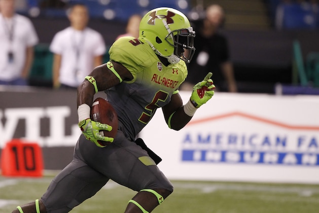 Jan 2, 2014; St. Petersburg, FL, USA; Team Nitro cornerback Jabrill Peppers (5) runs with the ball during a punt during the second half at Tropicana Field. Team Highlight defeated the Team Nitro 31-21. Mandatory Credit: Kim Klement-USA TODAY Sports