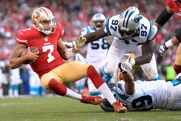SAN FRANCISCO, CA - NOVEMBER 10:  Colin Kaepernick #7 of the San Francisco 49ers gets sacked by Luke Kuechly #59 and Mario Addison #97 of the Carolina Panthers during the fourth quarter at Candlestick Park on November 10, 2013 in San Francisco, California. The Panthers won the game 10-9. (Photo by Thearon W. Henderson/Getty Images)
