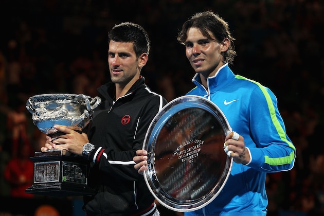 MELBOURNE, AUSTRALIA - JANUARY 29:  Novak Djokovic of Serbia (L) poses with the Norman Brookes Challenge Cup alongside Raphael Nadal of Spain with the runners-up trophy after winning the men's final match against Rafael Nadal of Spain during day fourteen of the 2012 Australian Open at Melbourne Park on January 29, 2012 in Melbourne, Australia.  (Photo by Quinn Rooney/Getty Images)