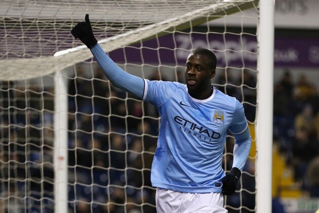 WEST BROMWICH, ENGLAND - DECEMBER 04:  Yaya Toure of Manchester City celebrates after scoring his second goal during the Premier League match between West Bromwich Albion and Manchester City at The Hawthorns on December 4, 2013 in West Bromwich, England.  (Photo by David Rogers/Getty Images)