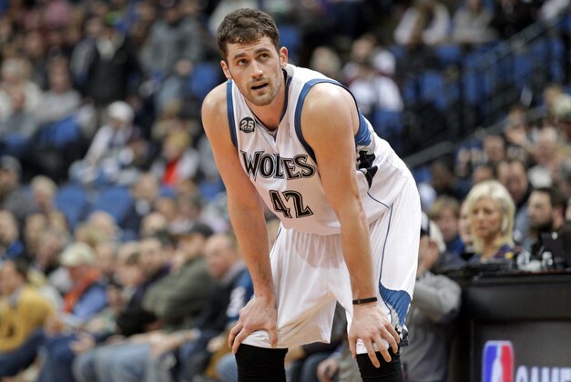Jan 8, 2014; Minneapolis, MN, USA; Minnesota Timberwolves forward Kevin Love (42) looks on during the first quarter against the Phoenix Suns at Target Center. The Suns defeated the Timberwolves 104-103. Mandatory Credit: Brace Hemmelgarn-USA TODAY Sports