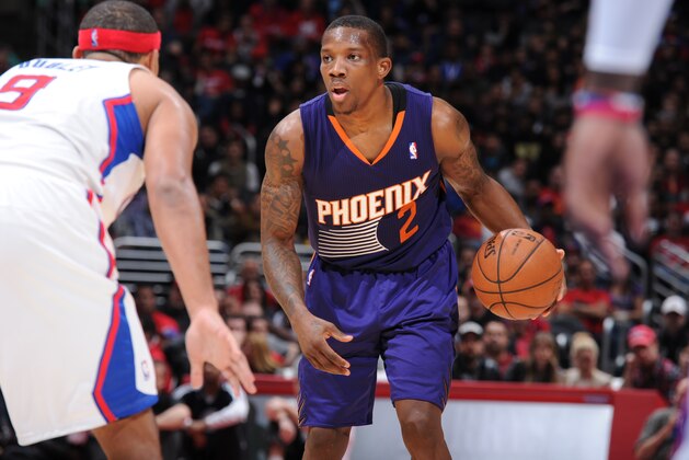LOS ANGELES, CA - DECEMBER 30: Eric Bledsoe #2 of the Phoenix Suns handles the basketball against Jared Dudley #9 of the Los Angeles Clippers at STAPLES Center on December 30, 2013 in Los Angeles, California. NOTE TO USER: User expressly acknowledges and agrees that, by downloading and/or using this Photograph, user is consenting to the terms and conditions of the Getty Images License Agreement. Mandatory Copyright Notice: Copyright 2013 NBAE (Photo by Andrew D. Bernstein/NBAE via Getty Images)