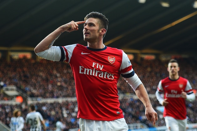 NEWCASTLE UPON TYNE, ENGLAND - DECEMBER 29:  Olivier Giroud of Arsenal celebrates scoring the opening goal during the Barclays Premier League match between Newcastle United and Arsenal at St James' Park on December 29, 2013 in Newcastle upon Tyne, England.  (Photo by Michael Regan/Getty Images)