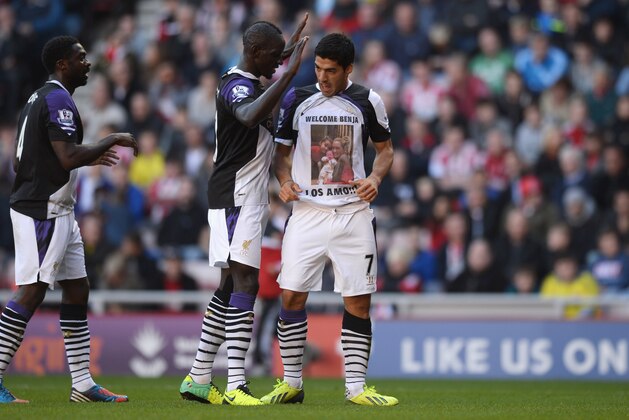 SUNDERLAND, ENGLAND - SEPTEMBER 29: Luis Suarez of Liverpool celebrates his first goal with Mamadou Sakho and Kolo Toure (L) during the Barclays Premier League match between Sunderland and Liverpool at the Stadium of Light on September 29, 2013 in Sunderland, England. (Photo by Gareth Copley/Getty Images) SUNDERLAND, ENGLAND - SEPTEMBER 29: Luis Suarez of Liverpool celebrates his first goal with Mamadou Sakho and Kolo Toure (L) during the Barclays Premier League match between Sunderland and Liverpool at the Stadium of Light on September 29, 2013 in Sunderland, England. (Photo by Gareth Copley/Getty Images)